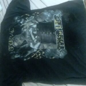 Vintage Tupoc Shaqur Tshirt. No holes on it and its 4 X large